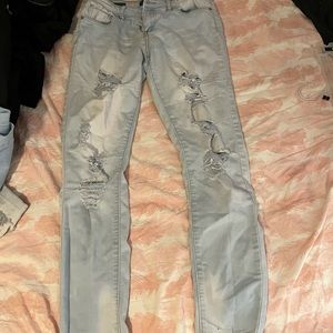 LIGHT BLUE RIPPED JEANS size 6